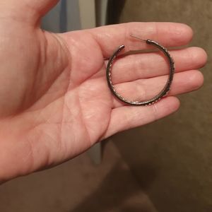 Earrings with white diamonds accents if different